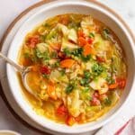 Spiced Cabbage Soup with Lemon, Ginger, and Fresh Herbs Recipe