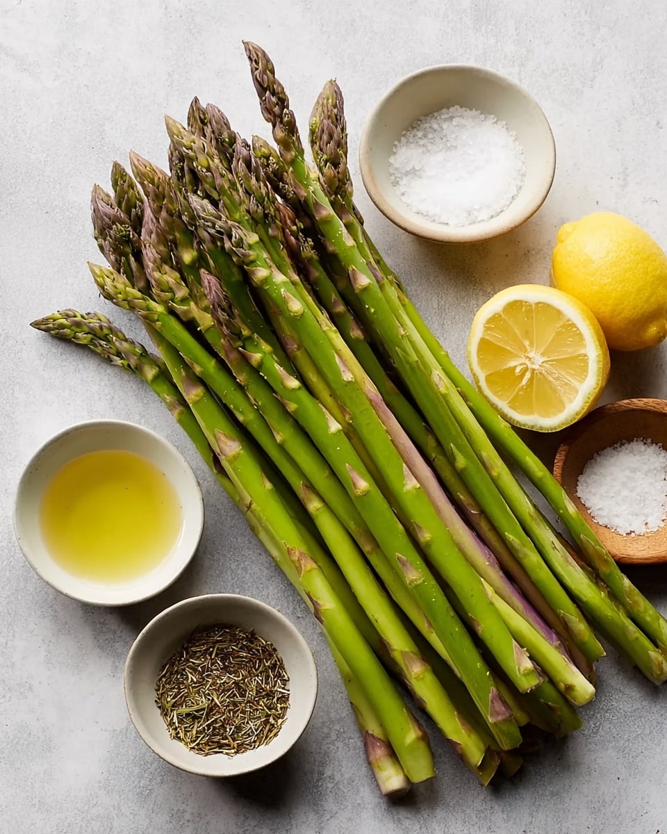 A bunch of fresh green asparagus spears lay diagonally on a white marbled surface, with their tips showing a mix of green and purple hues. To the right of the asparagus, there are two lemon halves with a bright yellow color, showing their juicy interior. Below the lemons, three small white bowls contain ingredients: the first bowl holds a pale yellow liquid, the second bowl has coarse white salt, and the third bowl is filled with a mix of dried herbs with brown and green tones. The whole scene is lit softly, highlighting the natural colors and fresh textures. photo taken with an iphone --ar 4:5 --v 7