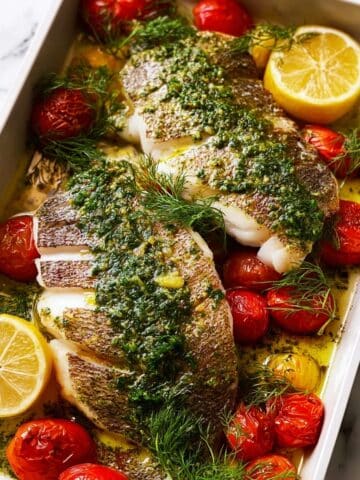Whole Baked Herb-Stuffed Fish with Garlic & Dill Butter Sauce Recipe