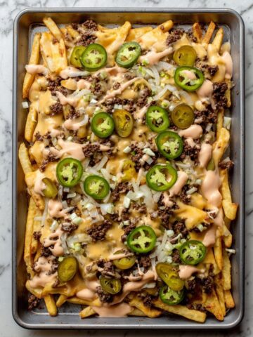 Smashburger Fries with Cheddar Cheese Sauce and Pickle-Jalapeño Topping Recipe