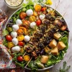 Pesto Chicken Caesar Salad with Tomatoes and Burrata Recipe