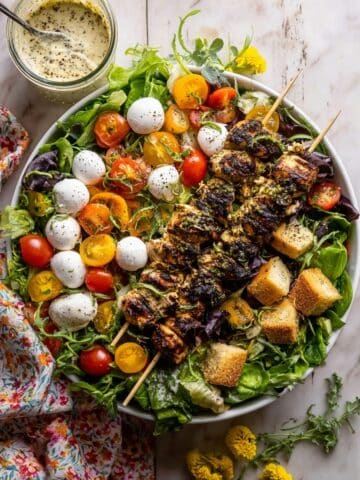 Pesto Chicken Caesar Salad with Tomatoes and Burrata Recipe