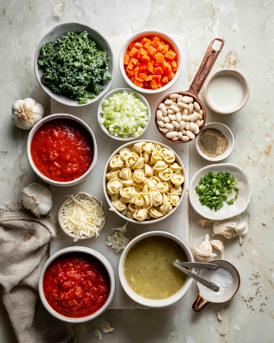 The image shows many small bowls and cups with different ingredients arranged on a white marbled surface. In the center, there is a white bowl filled with pale beige tortellini pasta. To the right of it is a white bowl full of white beans, and beside it is a small white bowl of chopped green herbs. Above that is a copper measuring cup with dark green chopped kale. Next to the kale, a white bowl contains finely chopped white onions. Above that, there is a white bowl of bright orange diced carrots with a small brown bowl filled with grated parmesan cheese on top. To the left of the carrots, a white cup holds thick red tomato paste, and behind that is a white bowl filled with milk. Below the tomato paste is a white bowl overflowing with chunky red tomato sauce. Left of the sauce, there is a large white bowl of greenish-yellow broth with a spoon inside. Below the broth, a small white bowl contains diced celery. Near the bottom right side, a round white plate holds white salt, black pepper, and brown dried herbs. Around the edges are a few garlic cloves and a light gray cloth. The photo is taken with an iphone --ar 4:5 --v 7