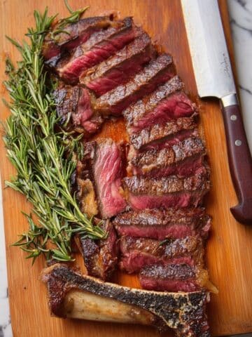 Perfectly Grilled Ribeye Steak with Herb Butter Recipe