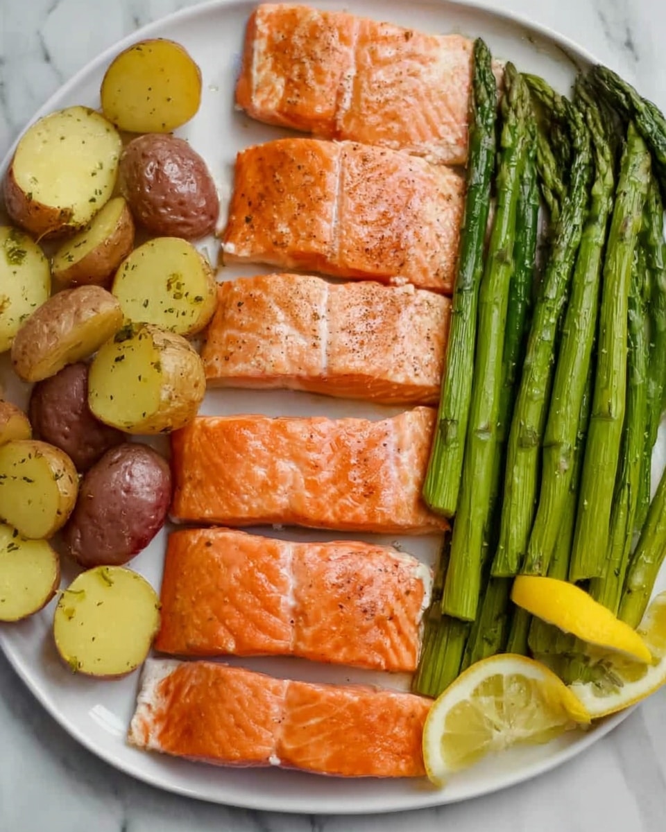 The image shows a white plate on a white marbled surface with four pieces of cooked salmon fillets arranged vertically on the left side. The salmon is light orange with visible grill marks. To the left of the salmon, there are roasted baby potatoes with a slightly golden texture. On the right side of the plate, there is a bunch of green asparagus spears laid out neatly, garnished with lemon wedges scattered among them. Photo taken with an iphone --ar 4:5 --v 7