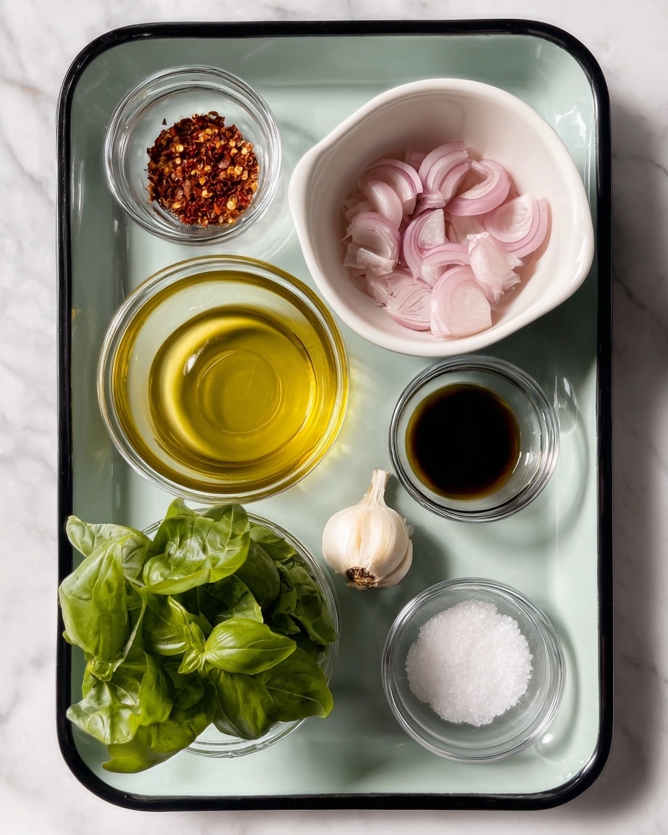 The image shows six small containers with different ingredients arranged on a white tray with black edges, set on a white marbled surface. On the top right, a white bowl holds sliced light purple shallots with a smooth texture. To its left, a small clear glass bowl contains red chili flakes with a coarse texture. Below the chili flakes, a small clear glass bowl holds golden yellow olive oil with a smooth, shiny surface. At the center, a small white bowl has a single clove of garlic with a smooth pale surface. Below to the left, a clear glass cup filled with bright green fresh basil leaves with a soft, leafy texture stands out. To its right, a small clear glass bowl contains dark amber vinegar with a smooth liquid surface. Finally, at the bottom right, a small white bowl holds coarse white salt. Photo taken with an iphone --ar 4:5 --v 7