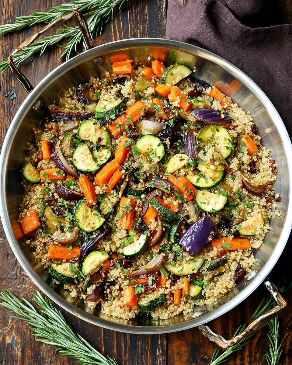 A large metal pan filled with three layers: the bottom layer is light brown cooked quinoa with a fluffy texture, the middle layer is mixed roasted vegetables including green zucchini slices, orange carrot pieces, and purple onion chunks showing a slightly charred, soft texture, and the top layer is finely chopped green herbs sprinkled evenly for freshness. The pan is on a dark wooden surface with fresh green rosemary sprigs nearby. Photo taken with an iphone --ar 4:5 --v 7